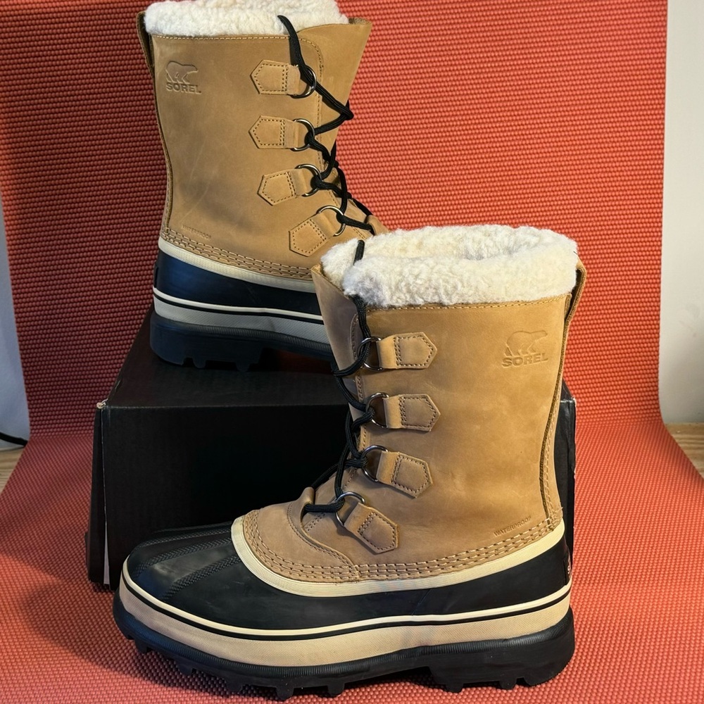 Sorel Tan and Black Winter Boots